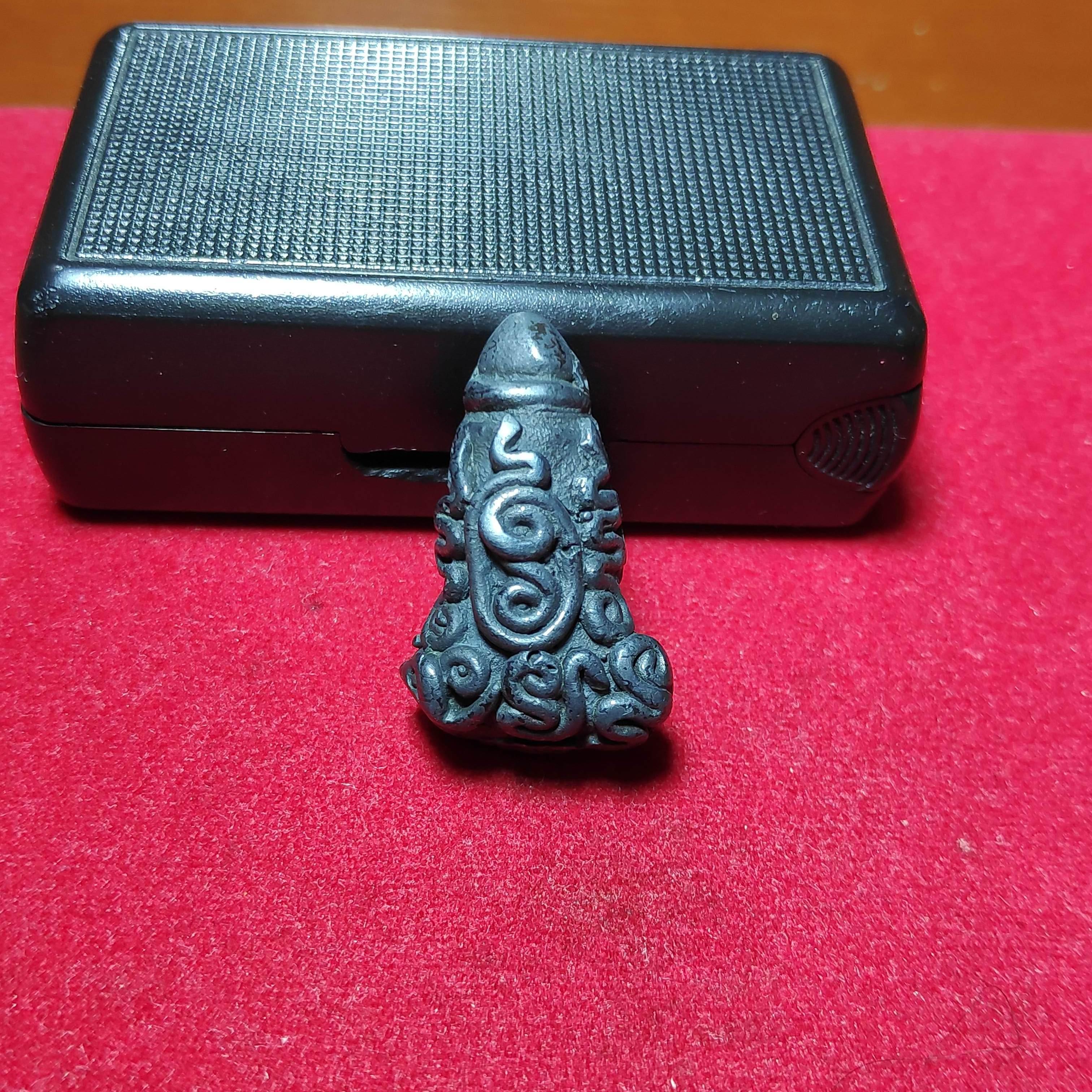 รูปหล่อพระปิดตาพิมพ์หัวจรวดหลวงพ่อทาวัดพะเนียงเเตกเนื้อเมฆพัตร