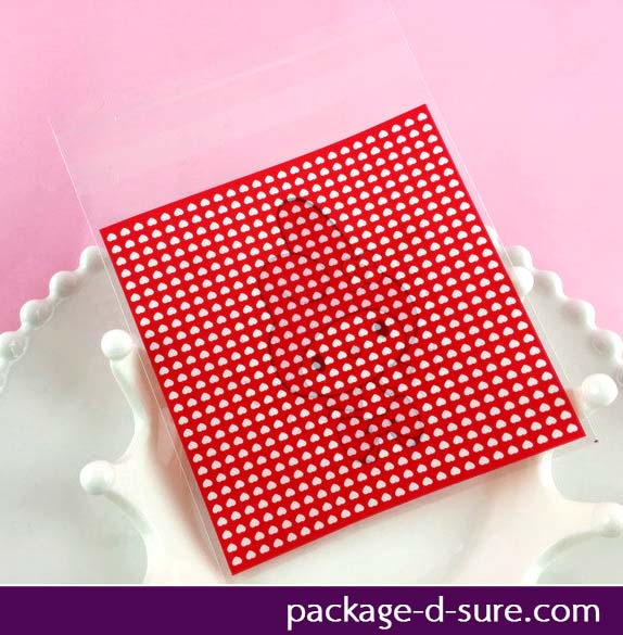 ล้างสต็อก//ถุงคุกกี้ แถบกาว 7x7 ลายกระต่ายเมโลดี้ พื้นหลังแดง แพ็ค 100 ใบ