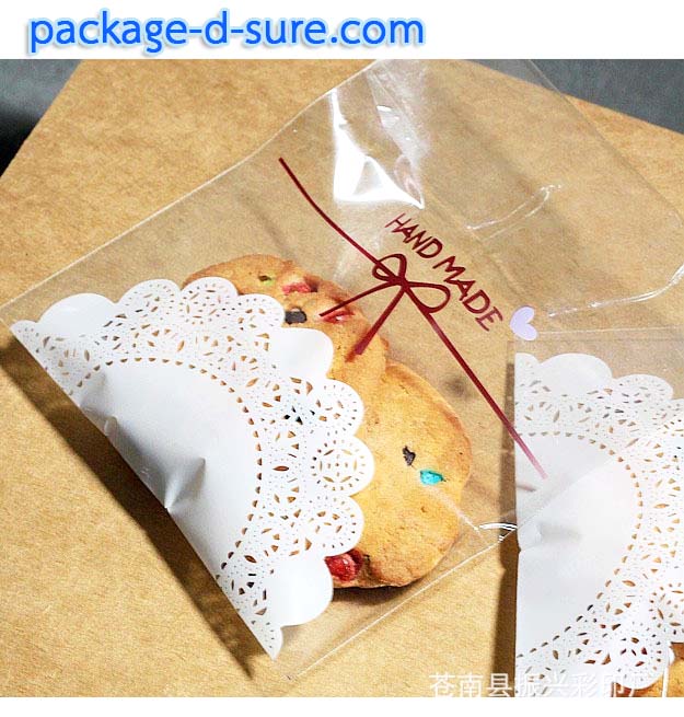 ล้างสต็อก//ถุงคุกกี้ แถบกาว 7x7 ถุงใส ลายโบว์ ลูกไม้ขาว แพ็ค 100 ใบ