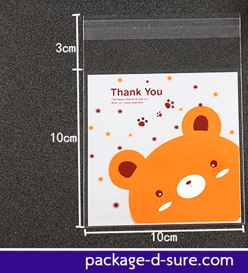 ล้างสต็อก//ถุงคุกกี้ แถบกาว 10x10 ลายหมีสีส้ม พื้นขาว แพ็ค 100 ใบ