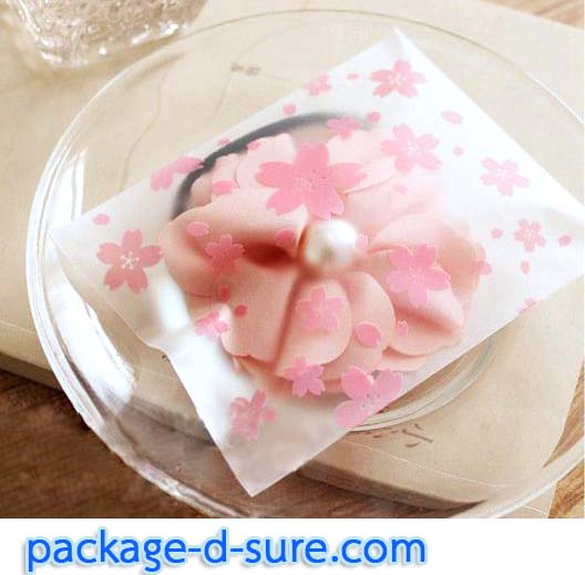 ล้างสต็อก//ถุงคุกกี้ แถบกาว 7x7 ลายดอกซากุระชมพู เนื้อกึ่งขุ่น แพ็ค 100 ใบ