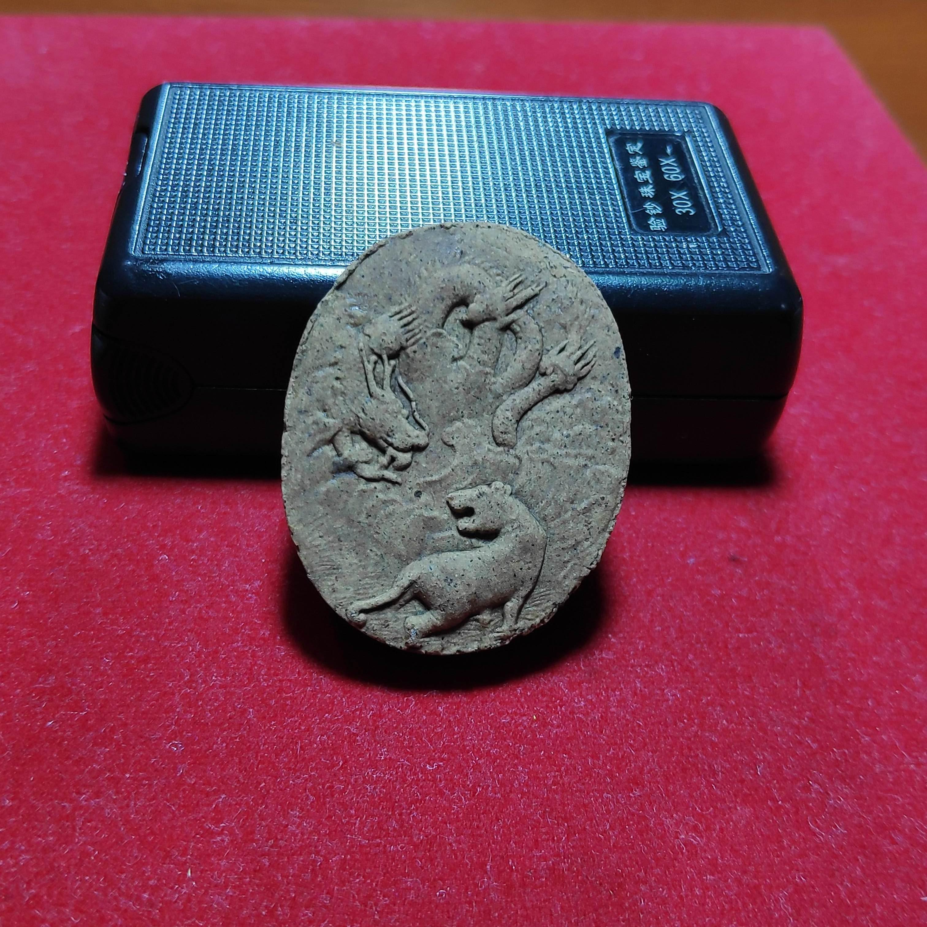 พระนาคปรกหลังเสือมังกรเนื้อผงวัดหนามเเดงปี2553