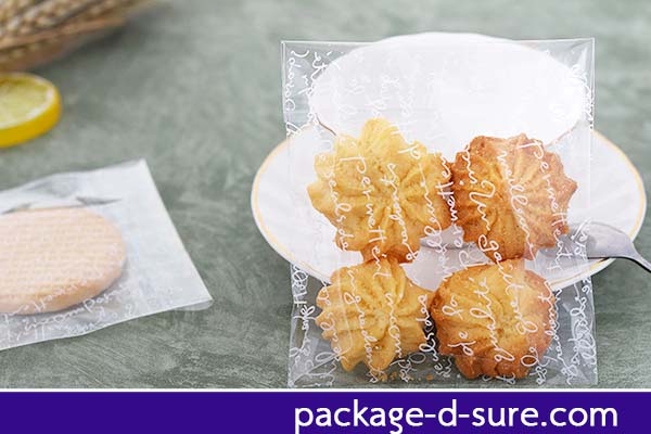 ล้างสต็อก//ถุงคุกกี้ แถบกาว 10x11 ลายตัวอักษรขาว พื้นใส แพ็ค 100 ใบ