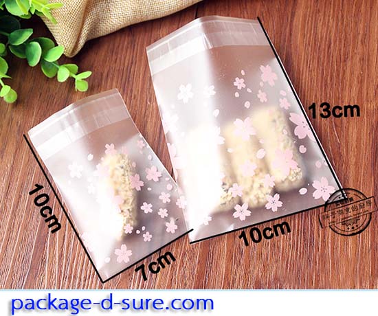 ล้างสต็อก//ถุงคุกกี้ แถบกาว 7x7 ลายดอกซากุระชมพู เนื้อกึ่งขุ่น แพ็ค 100 ใบ