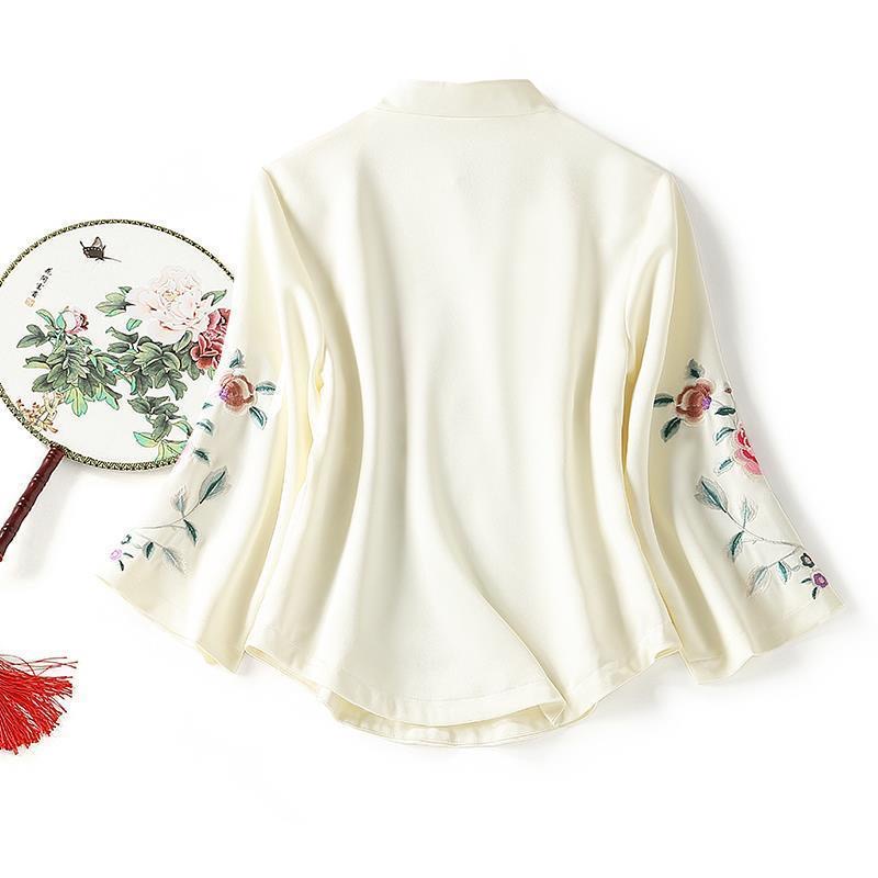 เสื้อสีขาว ลายนกยูง ลายปัก ผ้าลินินผสมซาติน