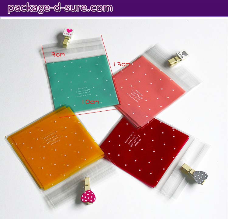 ล้างสต็อก//ถุงคุกกี้ แถบกาว 10x10 ลายจุดขาว พื้นหลังสีชมพู แพ็ค 100 ใบ