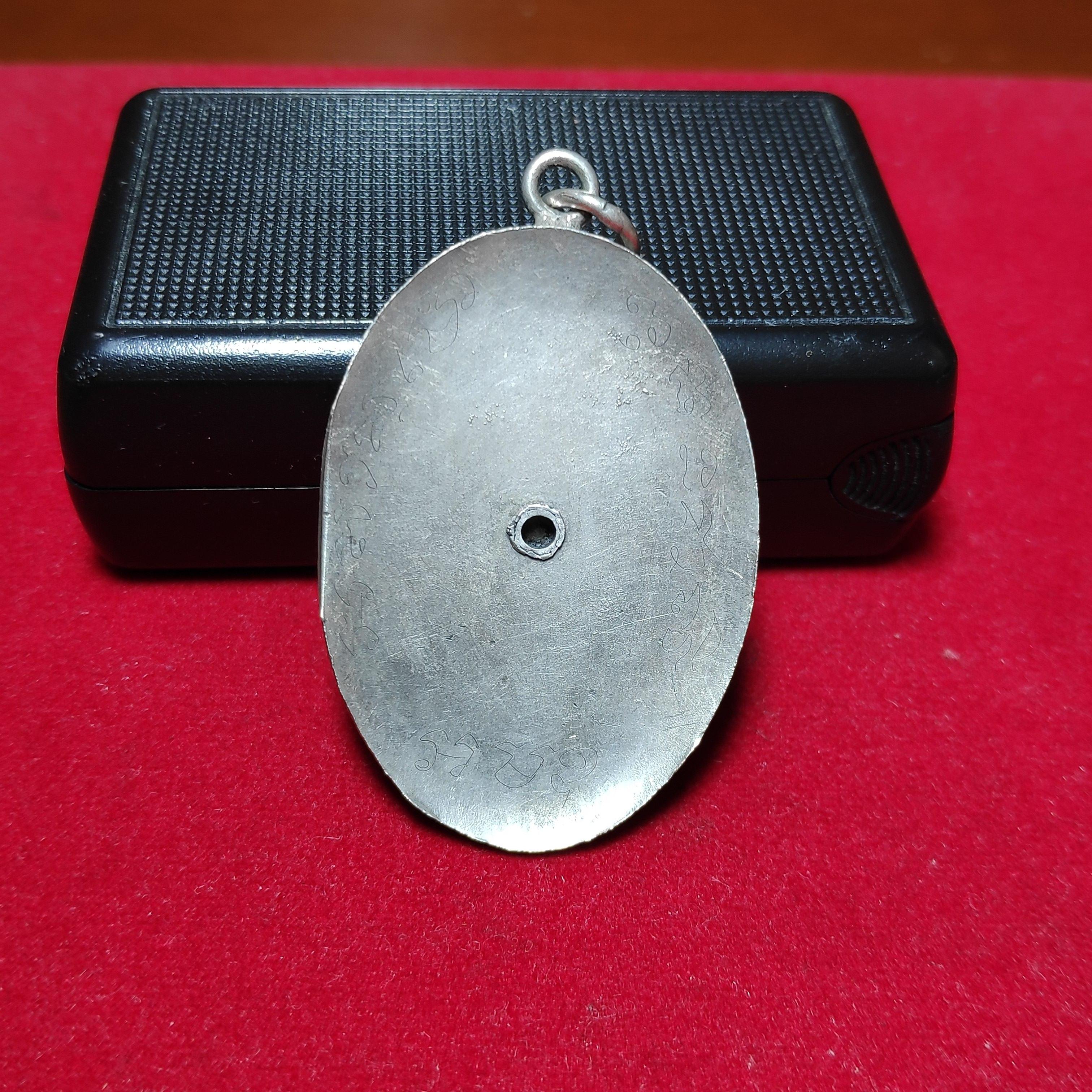 เหรียญรูปไข่พระพรหมสี่หน้าอาจารย์เฮงไพรวัลย์เนื้อเงินปี2472