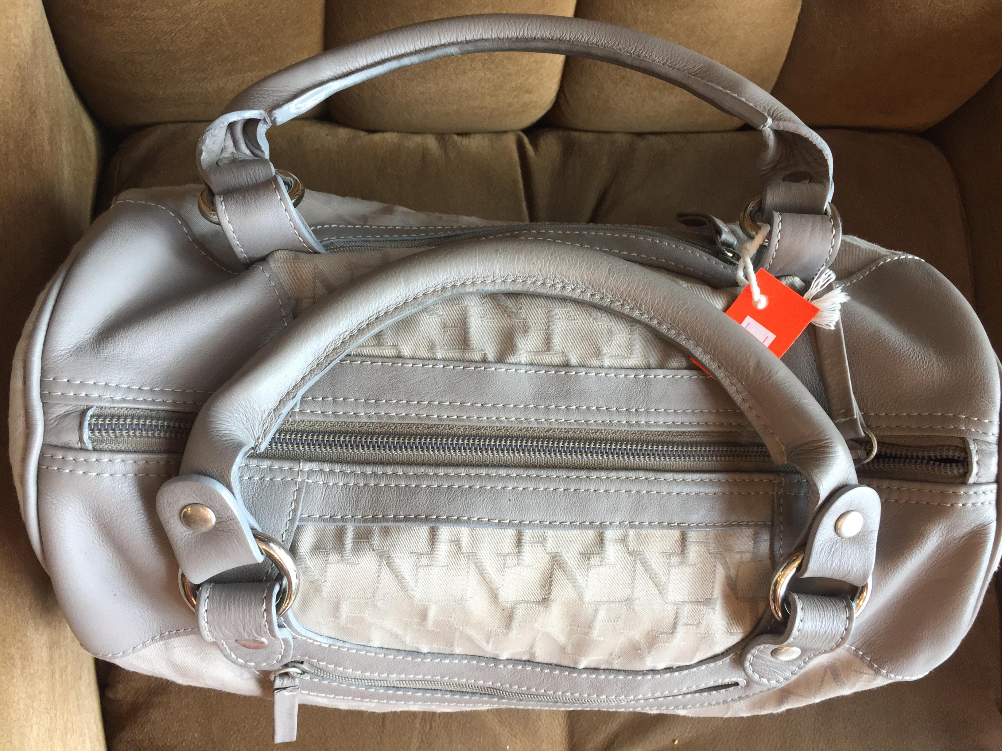 กระเป๋าถือ FLY NOW