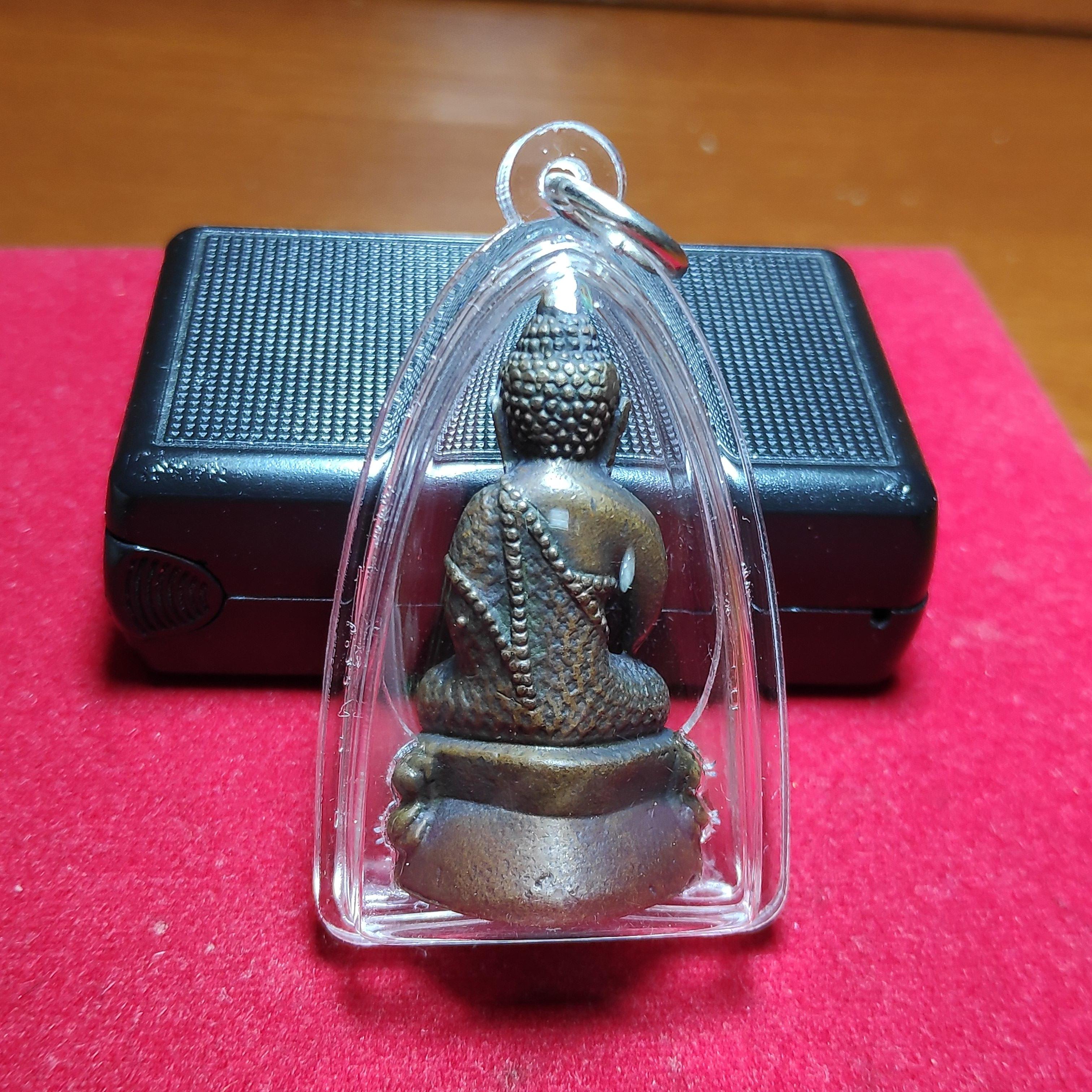 พระกริ่งจีวรลายดอก