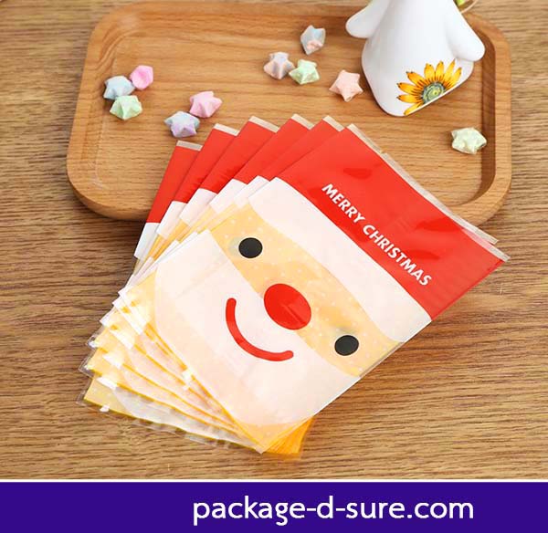 โปรโมชั่น//ถุงซีลกลางขอบเรียบ 10x13.5 ลายหน้าซานต้า หลังเหลืองจุด แพ็ค 100 ใบ