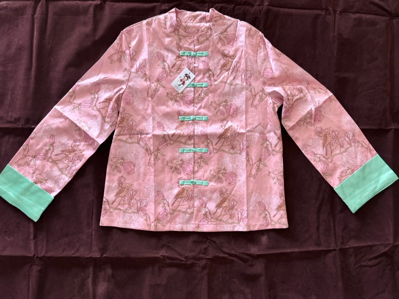 เสื้อจีนสีชมพู ขอบแขนเขียว