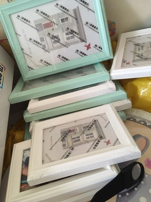 ชุดกรอบรูปติดผนัง Peony light blue กรอบรูปไม้ 14 ชิ้นพร้อมภาพตามแบบ + รูปแคนวาส 2 ชิ้นและวัสดุติดตั้ง