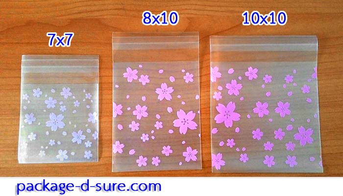 ล้างสต็อก//ถุงคุกกี้ แถบกาว 7x7 ลายดอกซากุระชมพู เนื้อกึ่งขุ่น แพ็ค 100 ใบ