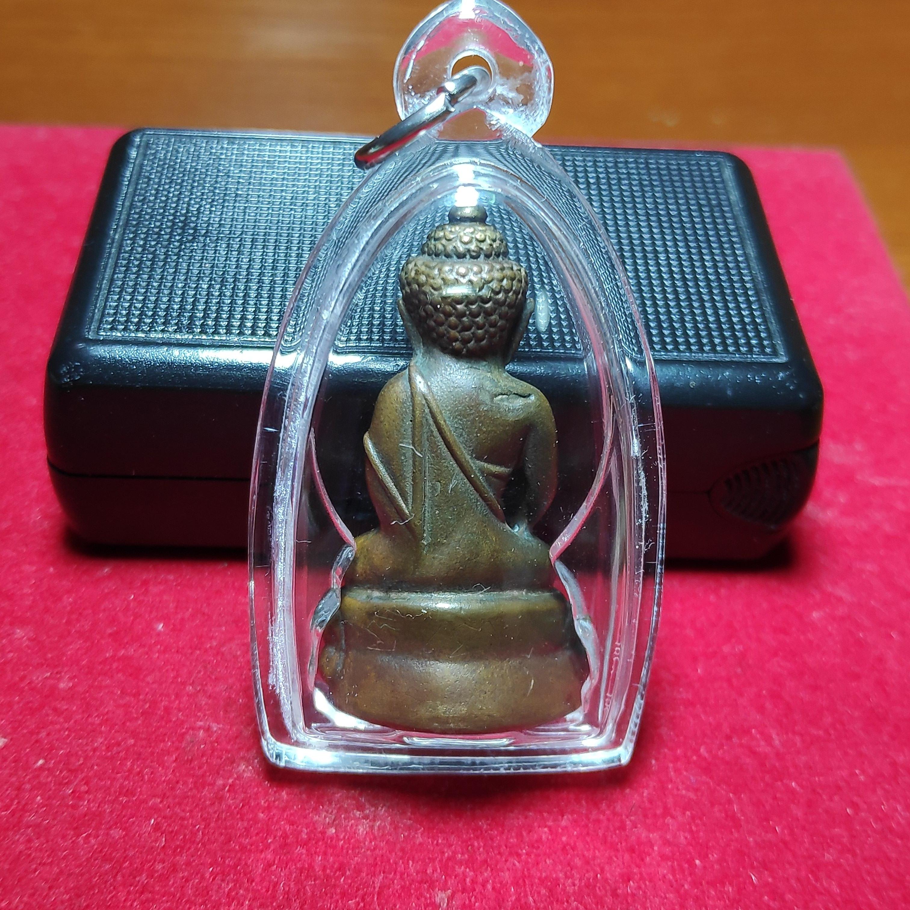 พระกริ่งเนื้อนวะหลังจารยันต์