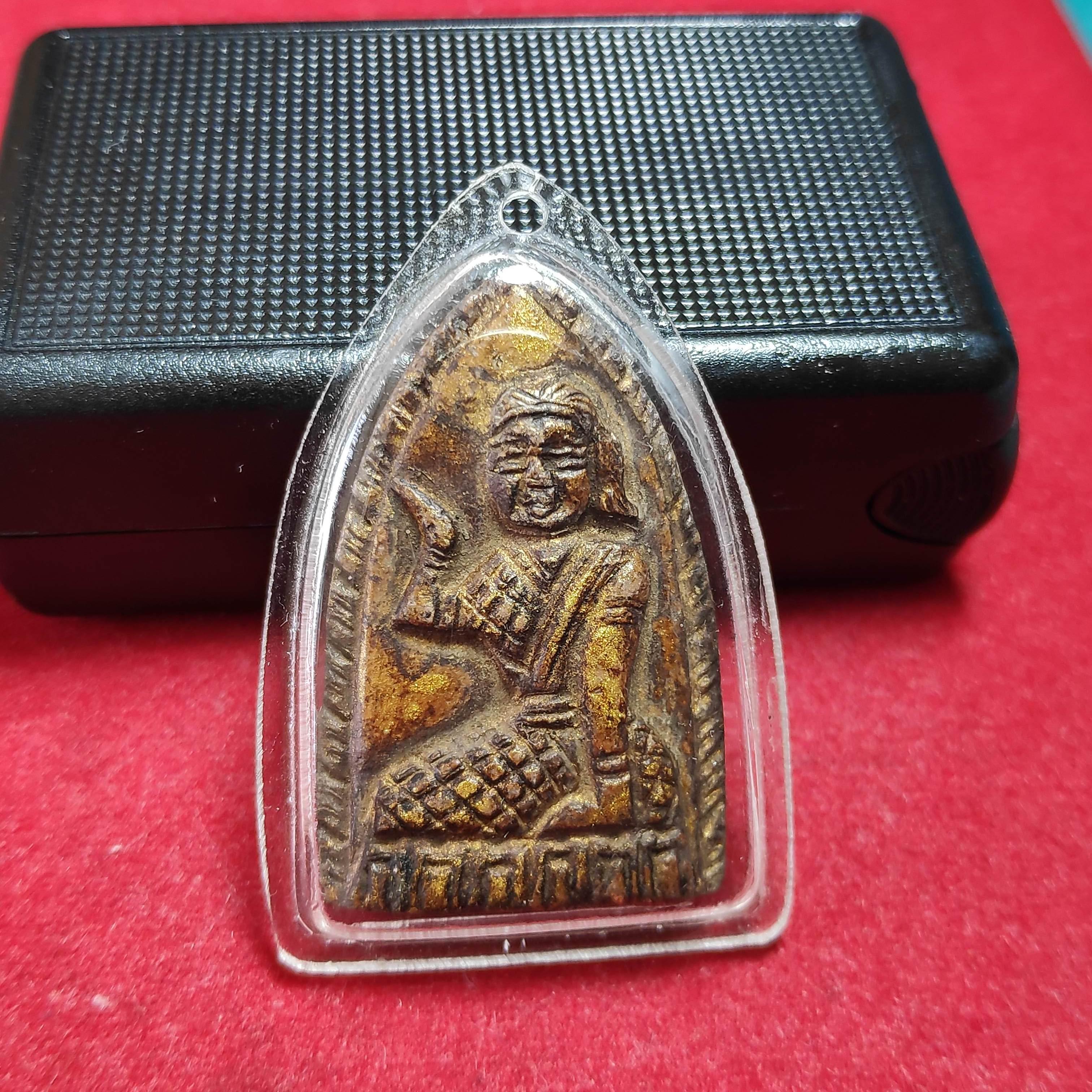 นางกวักหลวงพ่อเดิมวัดหนองโพหลังยันต์พุดซ้อนเนื้อผงพุทธคุณ