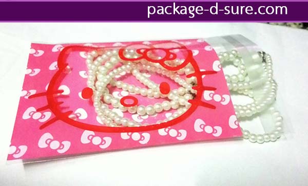 ล้างสต็อก//ถุงคุกกี้แถบกาว 10x13 เจาะใสหน้าคิตตี้ หลังชมพู โบว์ขาว แพ็ค 100 ใบ