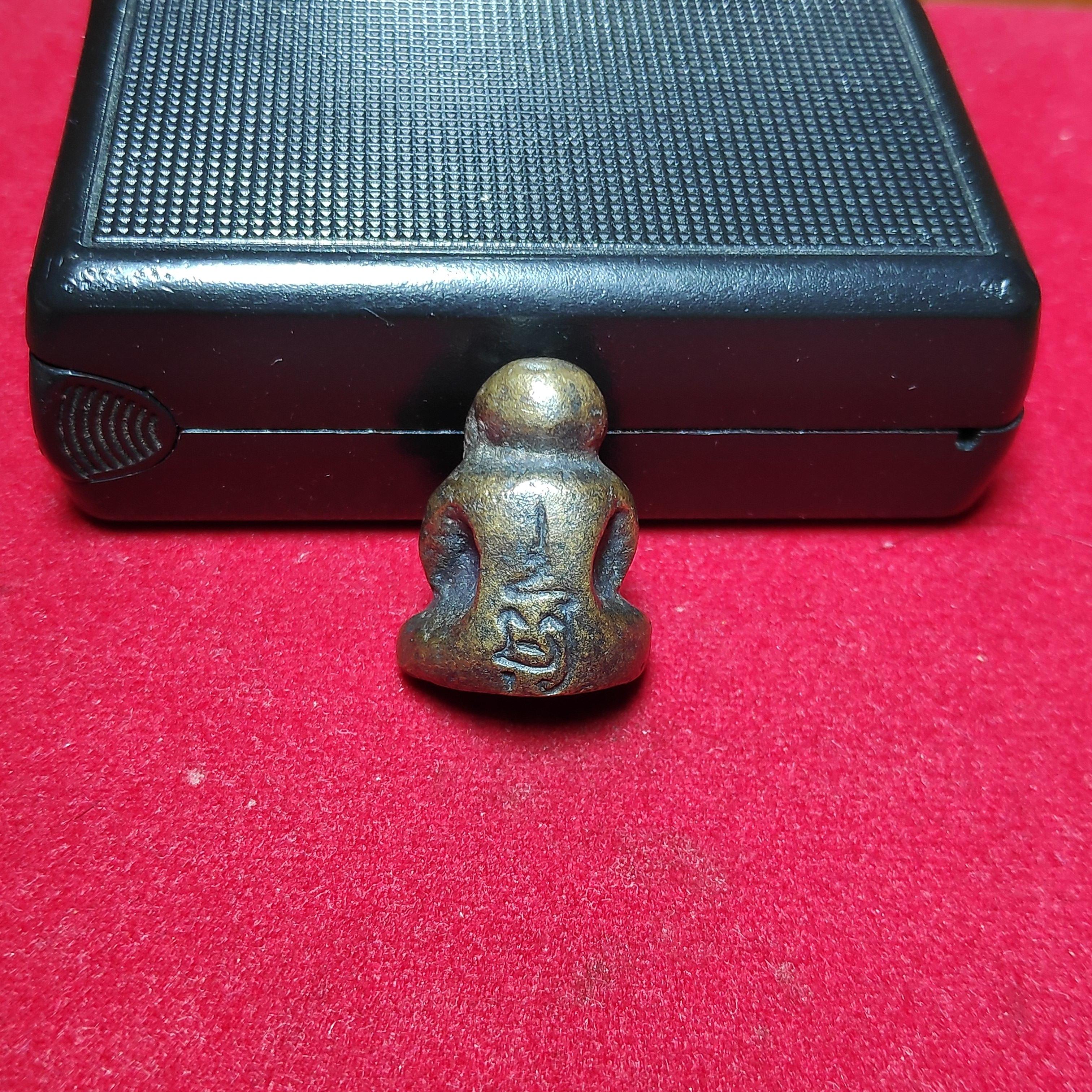 รูปหล่อพระปิดตาหลังยันต์อุเนื้อทองเหลือง