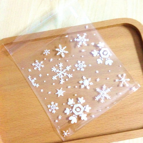 ล้างสต็อก//ถุงคุกกี้ แถบกาว 7x7 หน้าหลังใส ลายเกล็ดหิมะขาว แพ็ค 100 ใบ
