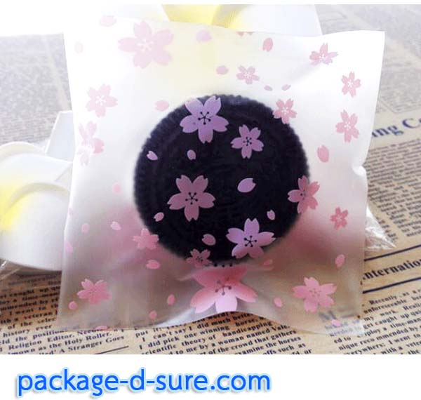 ล้างสต็อก//ถุงคุกกี้ แถบกาว 7x7 ลายดอกซากุระชมพู เนื้อกึ่งขุ่น แพ็ค 100 ใบ