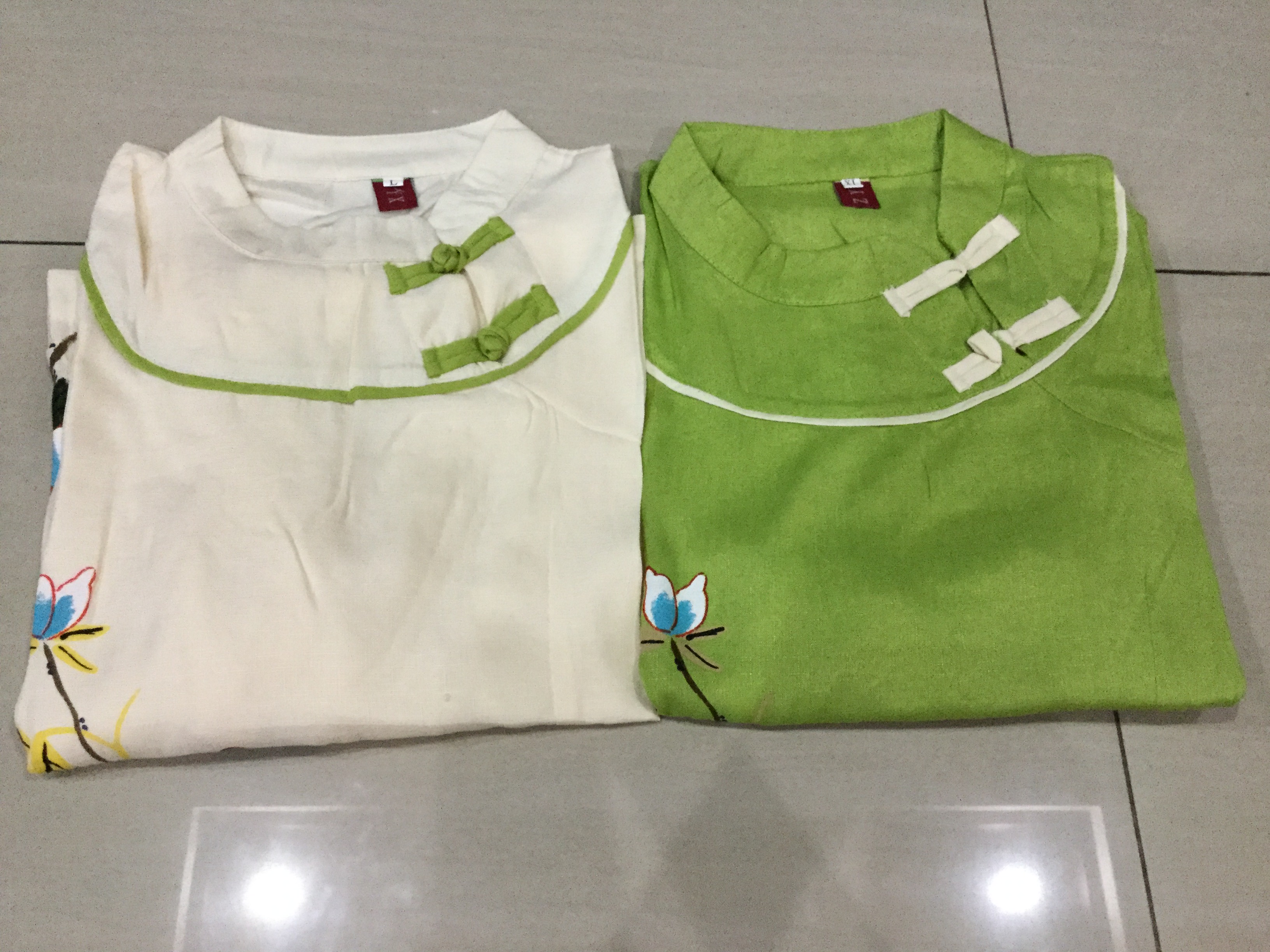 เสื้อสีขาว ผ้าฝ้ายลายพิมพ์ปลายเสื้อ รหัส LG 57 สินค้าพร้อมส่ง