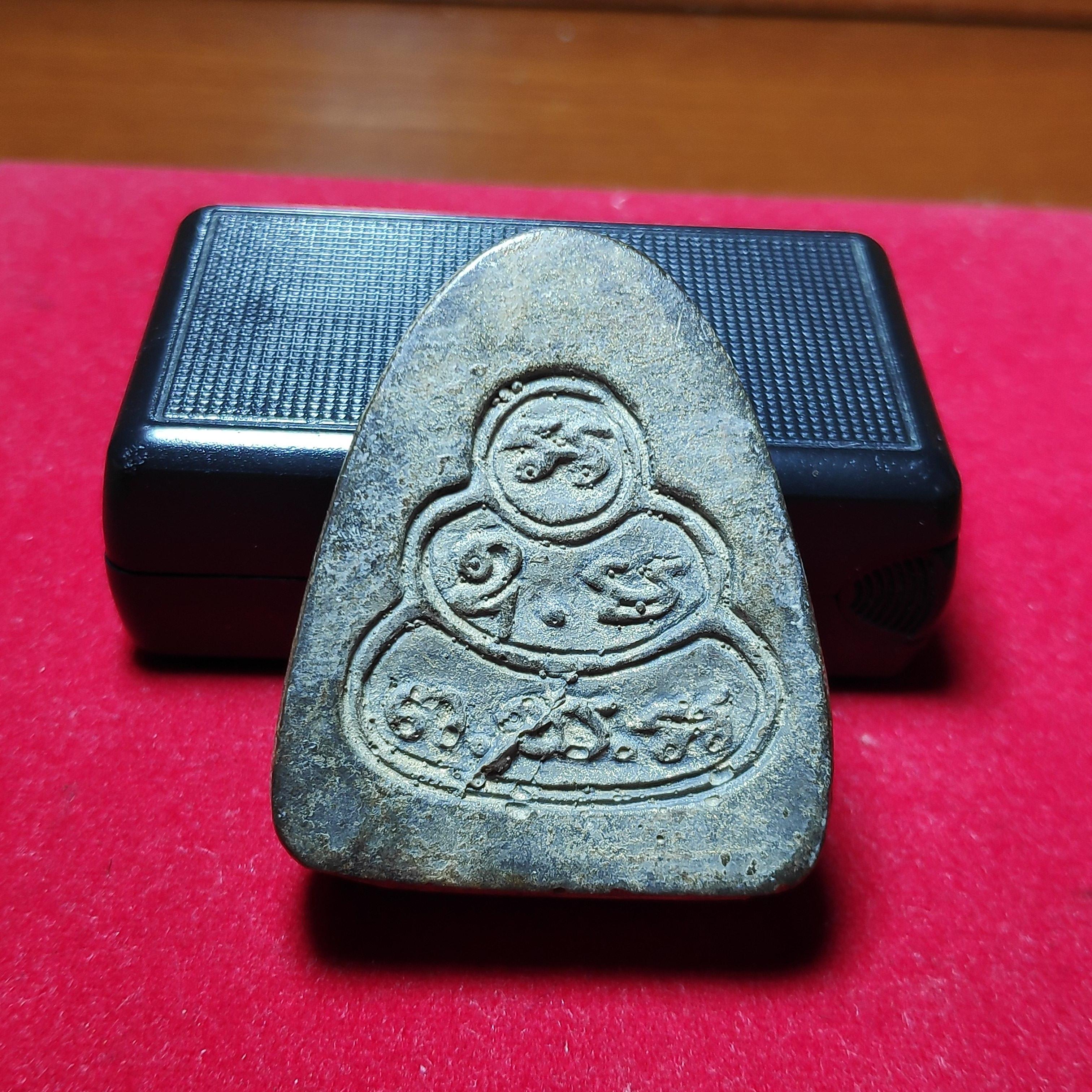 พระปิดตาจัมโบ้หลวงพ่อโด่วัดนามะตูมเนื้อผงคลุกรัก