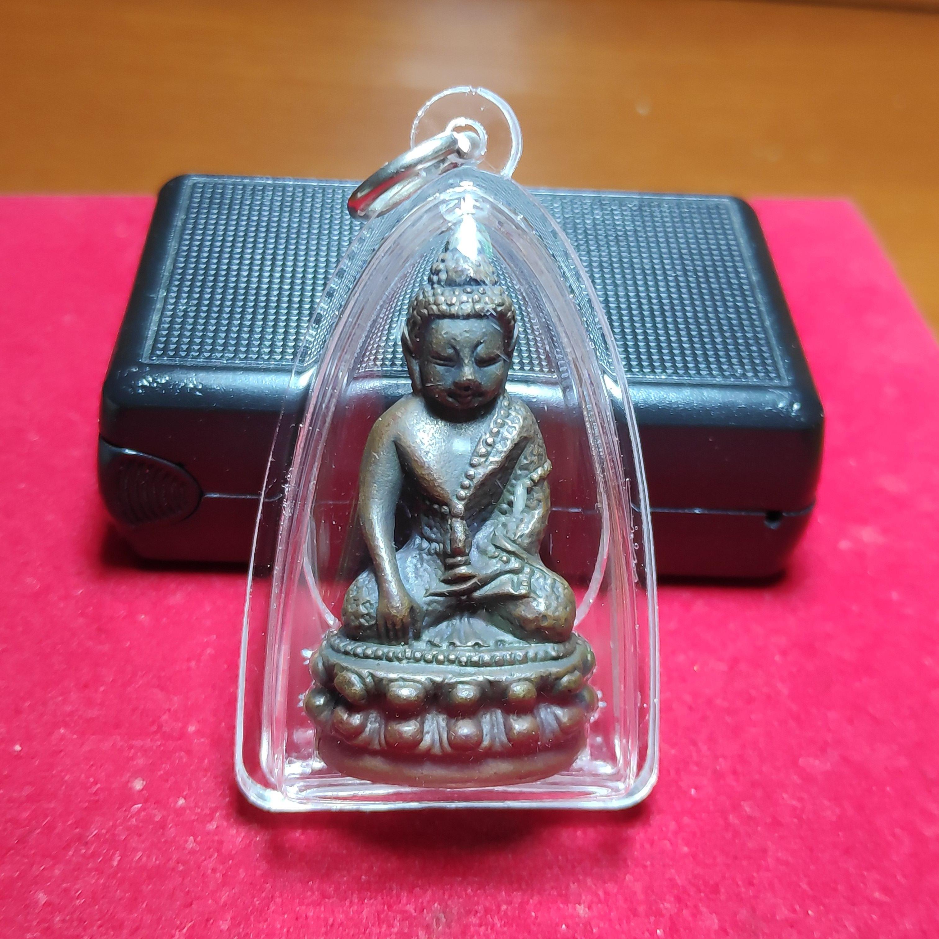 พระกริ่งจีวรลายดอก