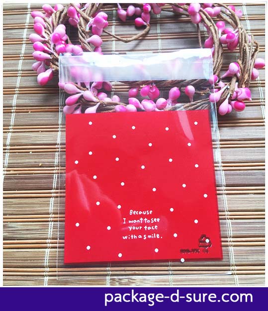 ล้างสต็อก//ถุงคุกกี้ แถบกาว 7x7 ลายจุดขาว พื้นหลังสีแดงสด แพ็ค 100 ใบ