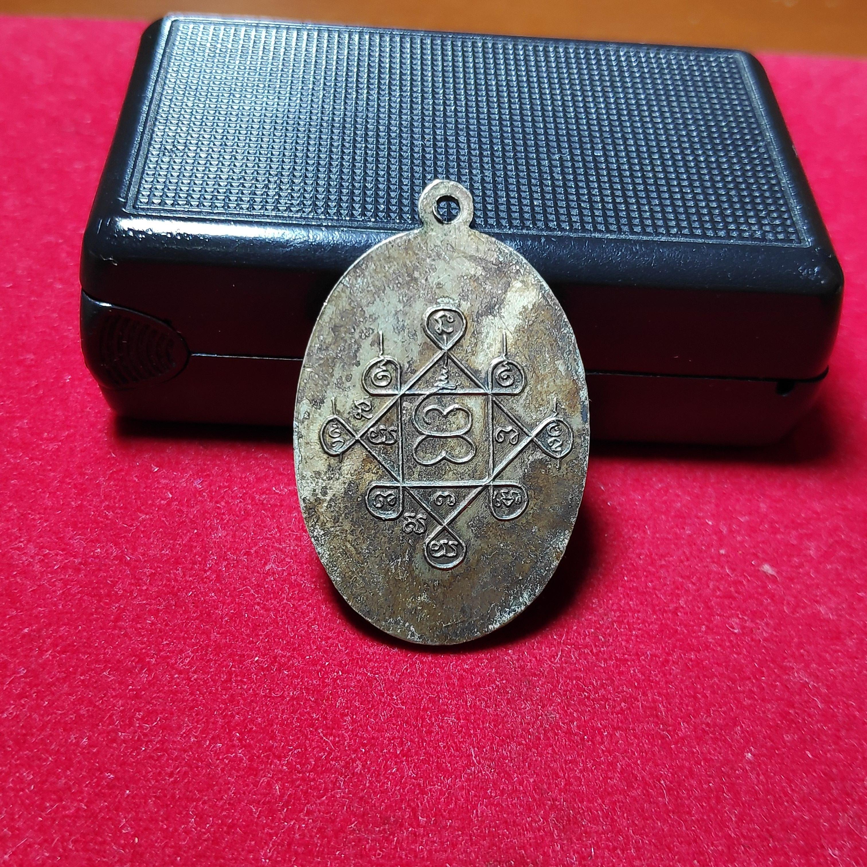 เหรียญคุณแม่บุญเรือนโตงบุญเติมวัดอาวุธวิกสิตารามปี2511