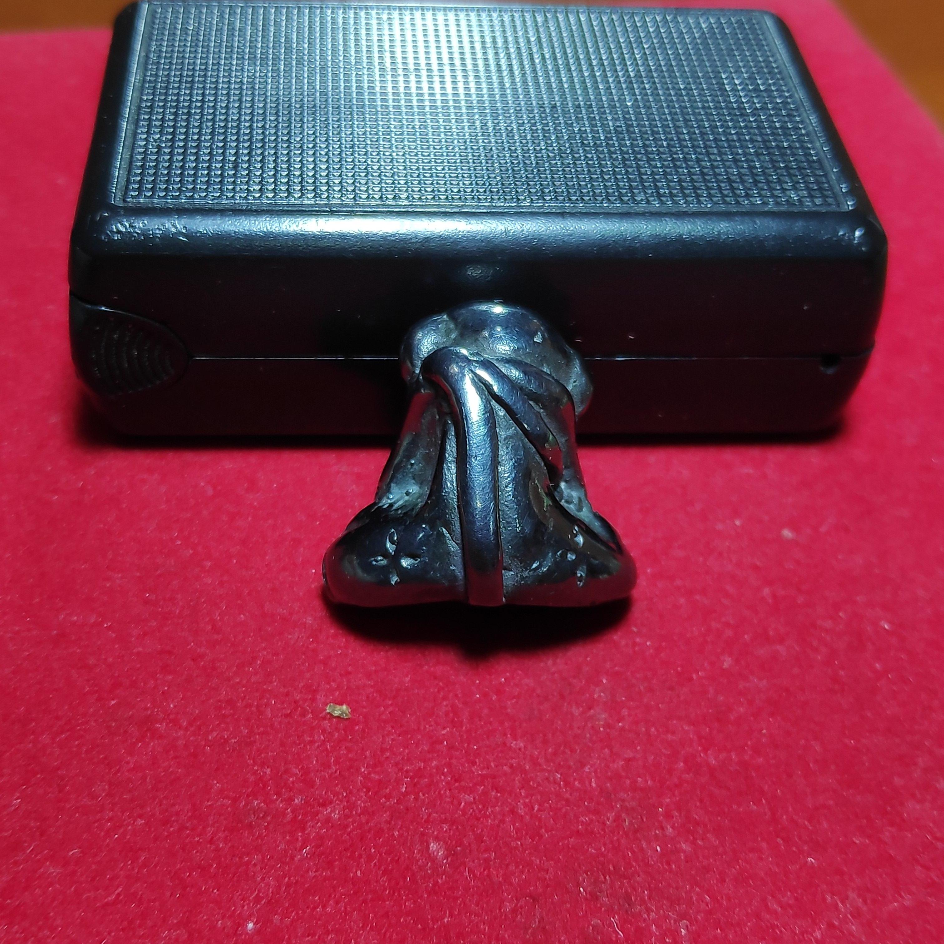 รูปหล่อพระปิดตาหูกระต่ายตอกโค๊ตดอกจันเนื้อเมฆพัตร