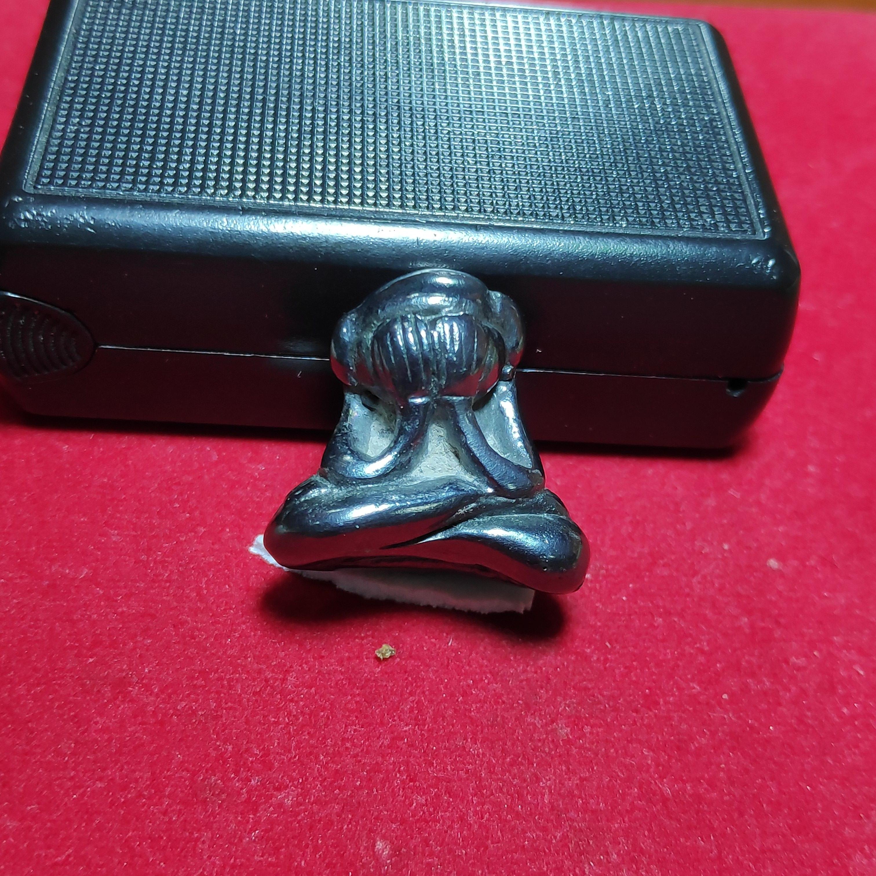 รูปหล่อพระปิดตาหูกระต่ายตอกโค๊ตดอกจันเนื้อเมฆพัตร