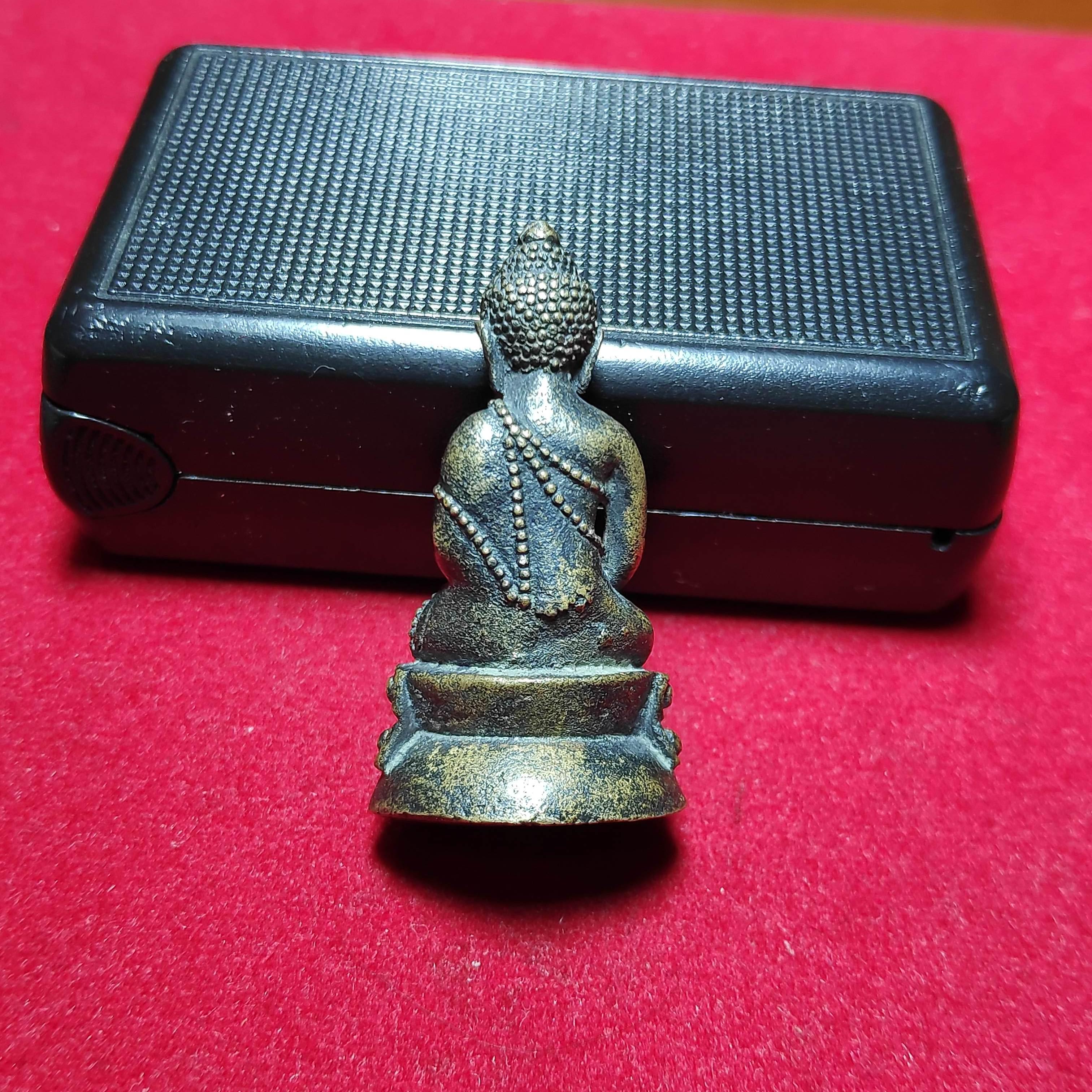 พระกริ่งหลวงพ่อหยอดวัดเเก้วเจริญก้นตอกโค๊ต