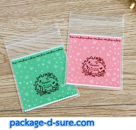 ล้างสต็อก//ถุงคุกกี้ แถบกาว 7x7 ลาย bonjour ลูกไม้ใส หลังเขียวอมฟ้า แพ็ค 100 ใบ