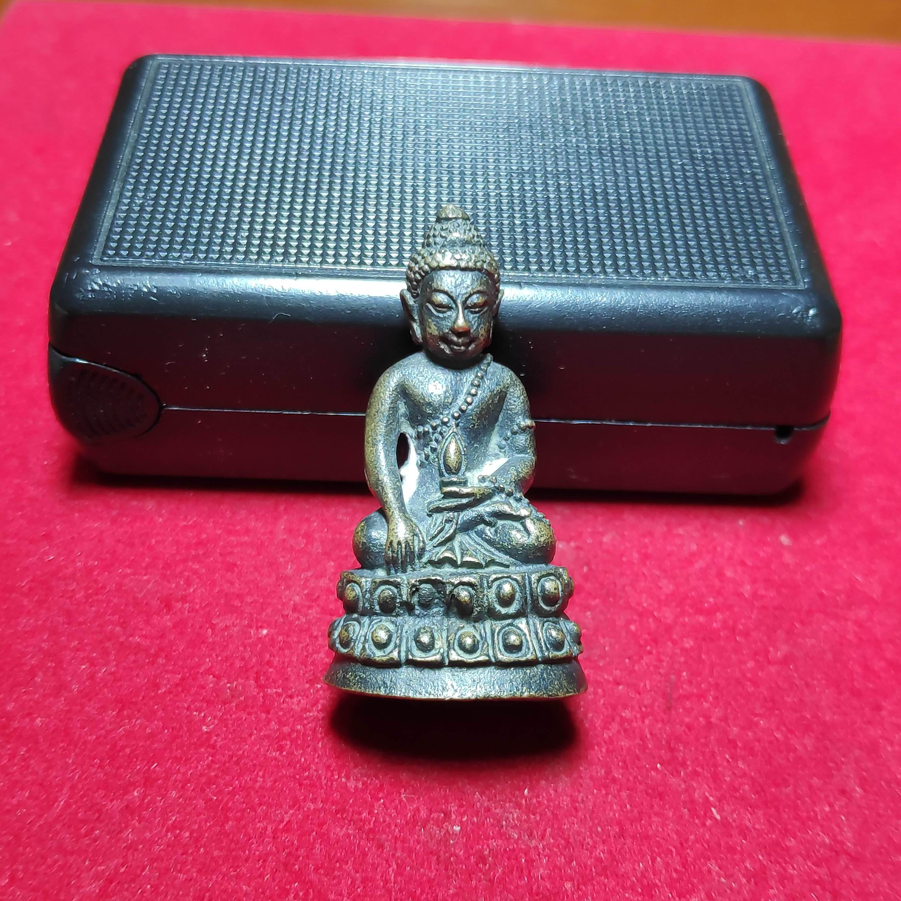 พระกริ่งหลวงพ่อหยอดวัดเเก้วเจริญก้นตอกโค๊ต