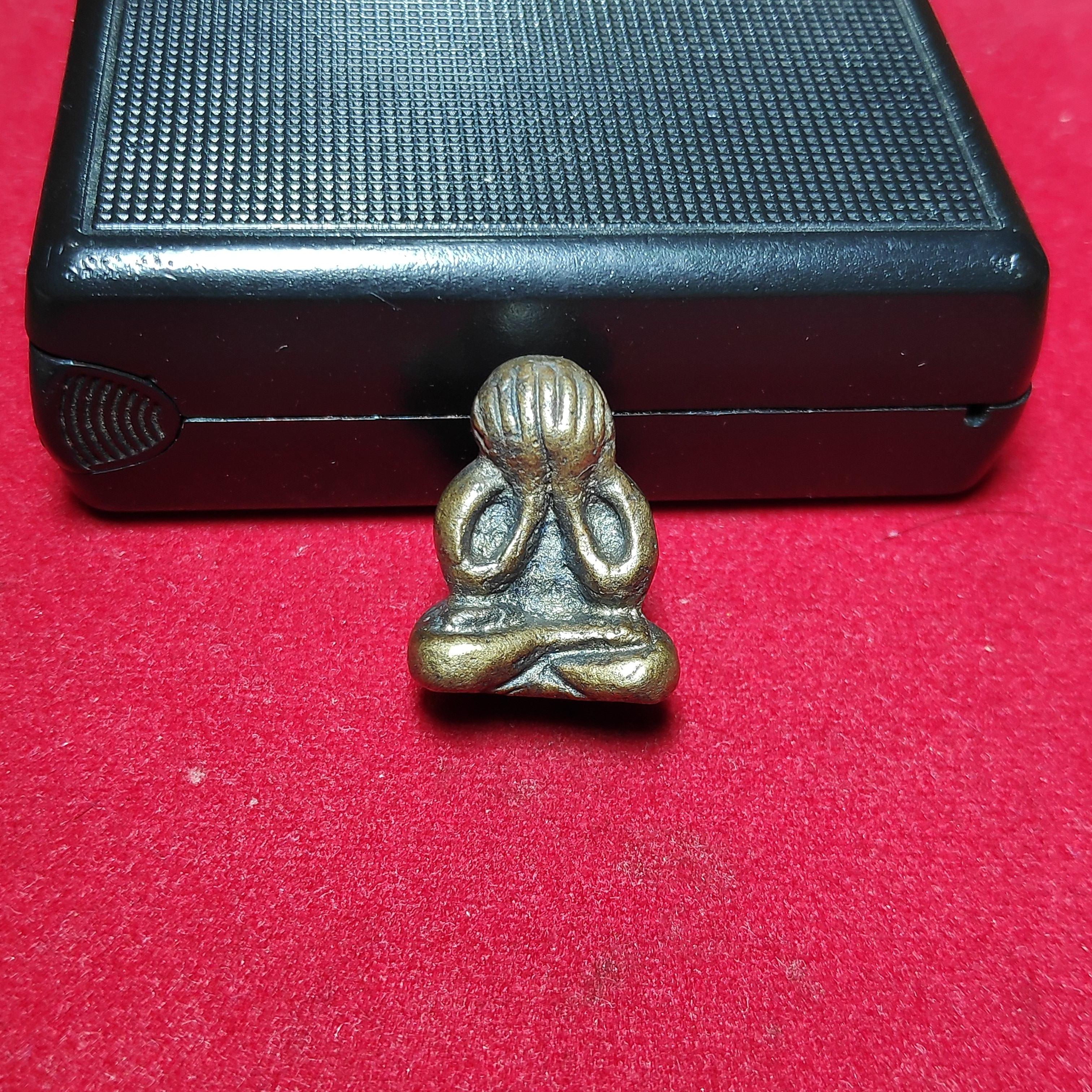 รูปหล่อพระปิดตาหลังยันต์อุเนื้อทองเหลือง