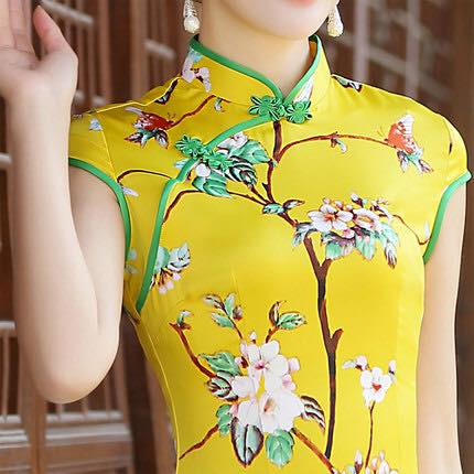 กี่เพ้าสั้นสีเหลืองผ้ามัน รหัส K140