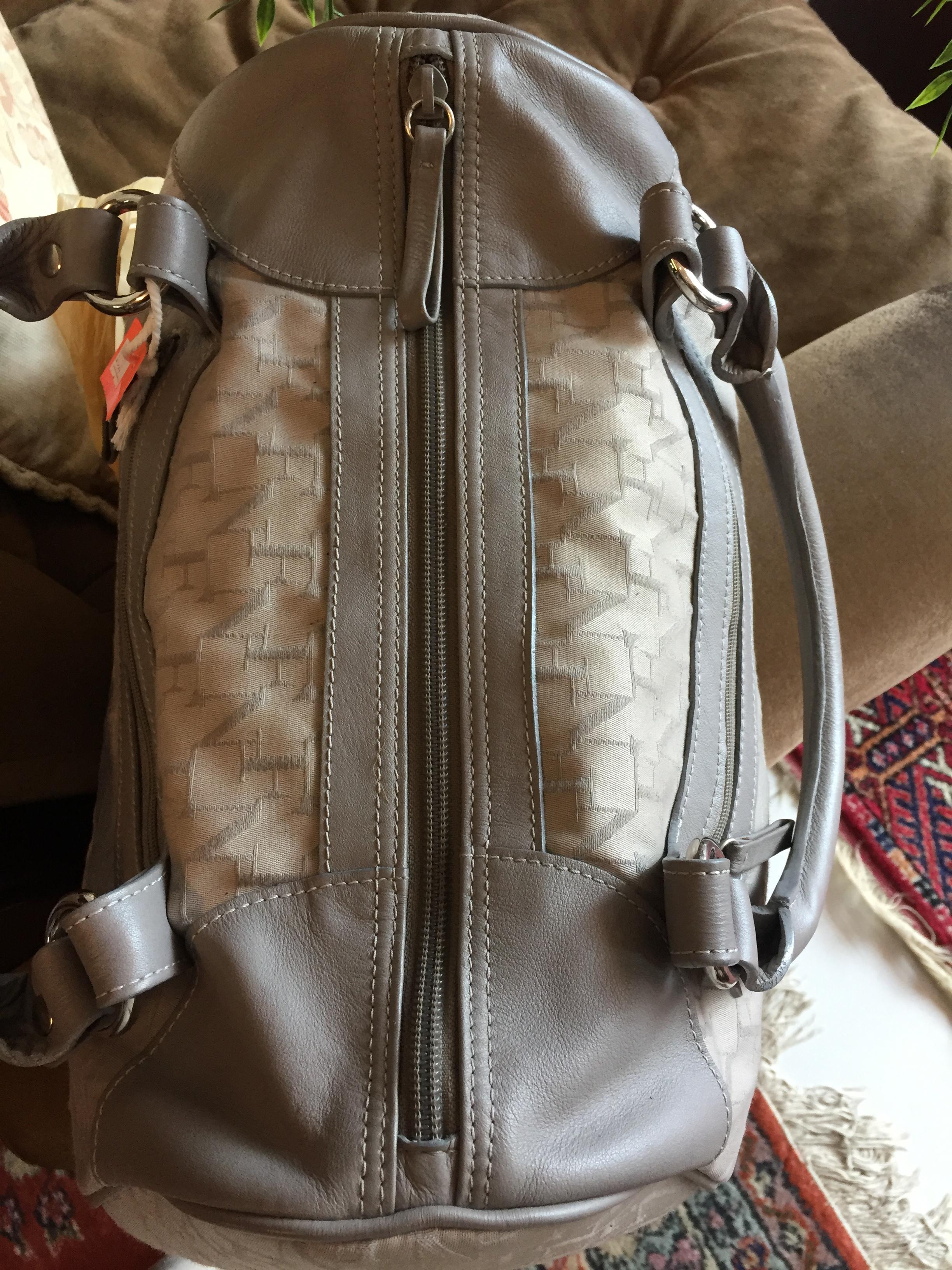 กระเป๋าถือ FLY NOW