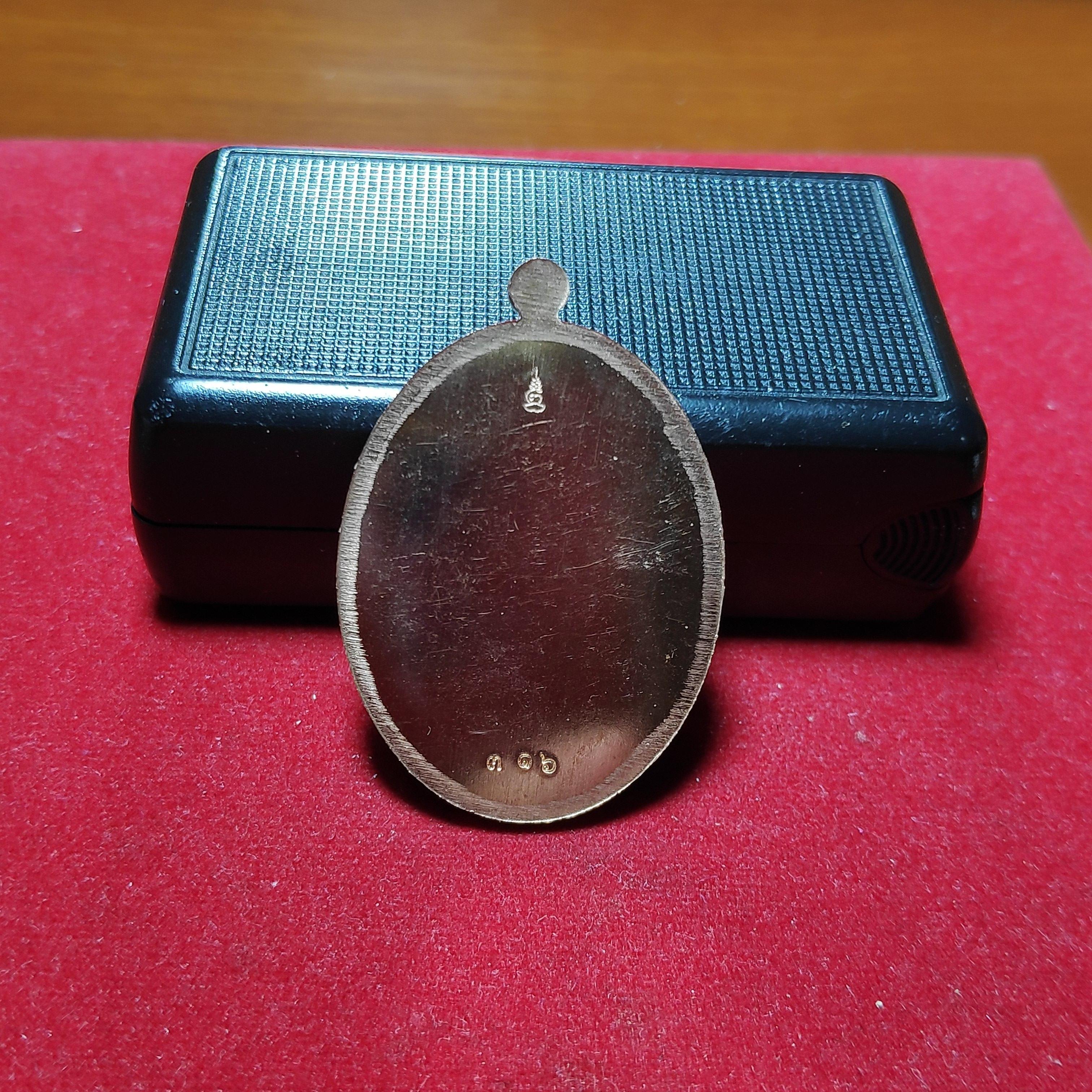 เหรียญเจริญพรหลวงพ่อดำกิตติภุทโทวัดเขาวงค์อายุ53ปี2562