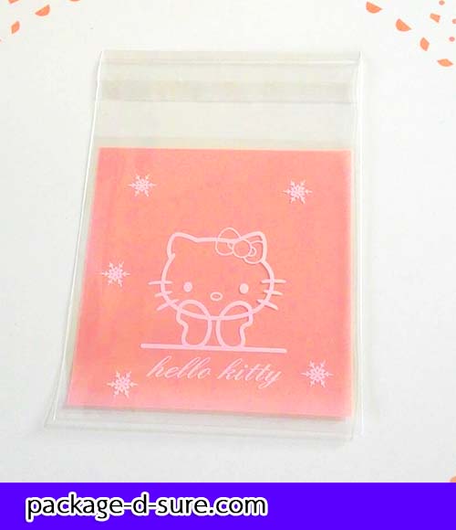 ล้างสต็อก//ถุงคุกกี้ แถบกาว 7x7 ลาย Hello Kitty พื้นชมพูอ่อน แพ็ค 100 ใบ