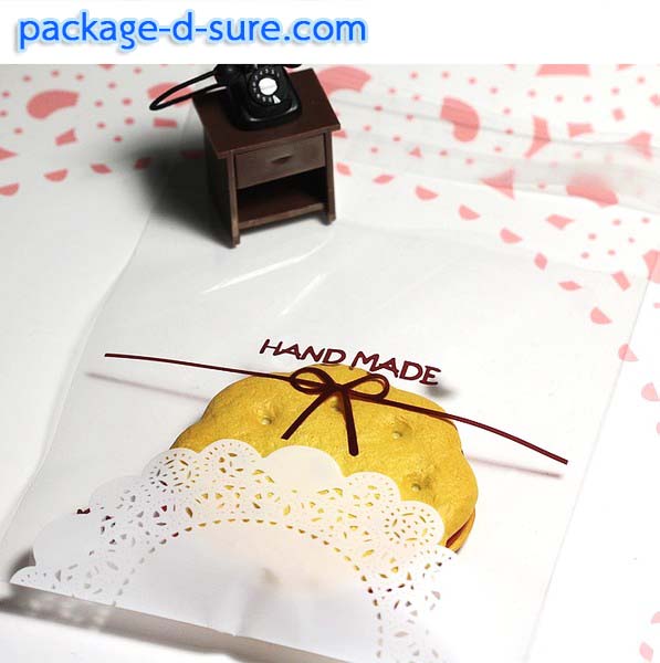 ล้างสต็อก//ถุงคุกกี้ แถบกาว 7x7 ถุงใส ลายโบว์ ลูกไม้ขาว แพ็ค 100 ใบ