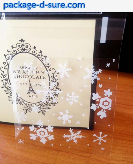 ล้างสต็อก//ถุงคุกกี้ แถบกาว 10x10 หน้าหลังใส ลายเกล็ดหิมะ แพ็ค 100 ใบ