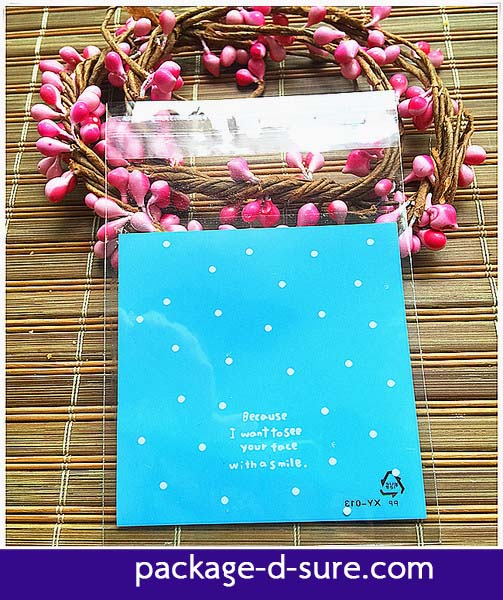 ล้างสต็อก//ถุงคุกกี้ แถบกาว 7x7 ลายจุดขาว พื้นหลังสีฟ้า แพ็ค 100 ใบ