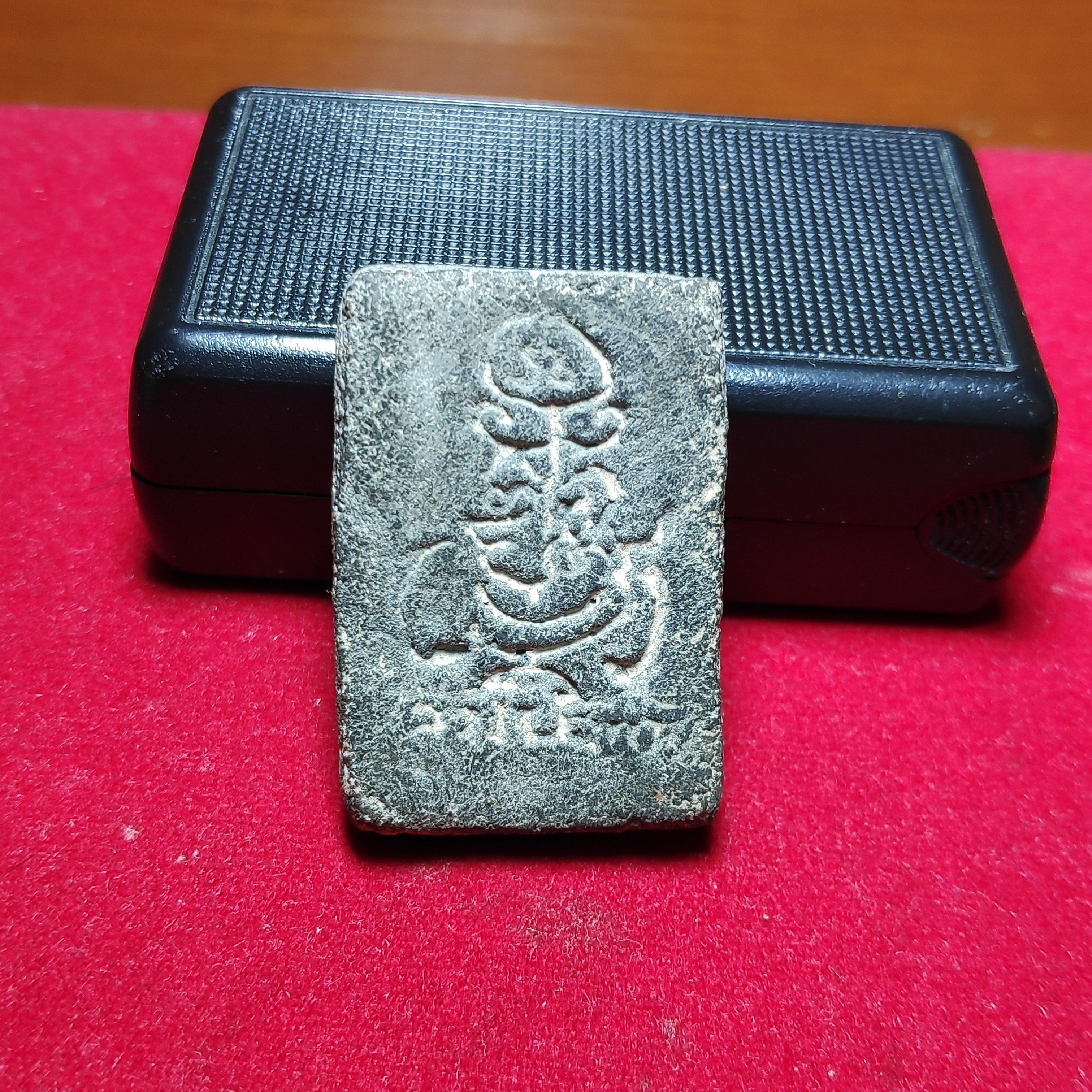 นางกวักหลวงพ่อกวยหลังยันต์เนื้อผงใบลาน