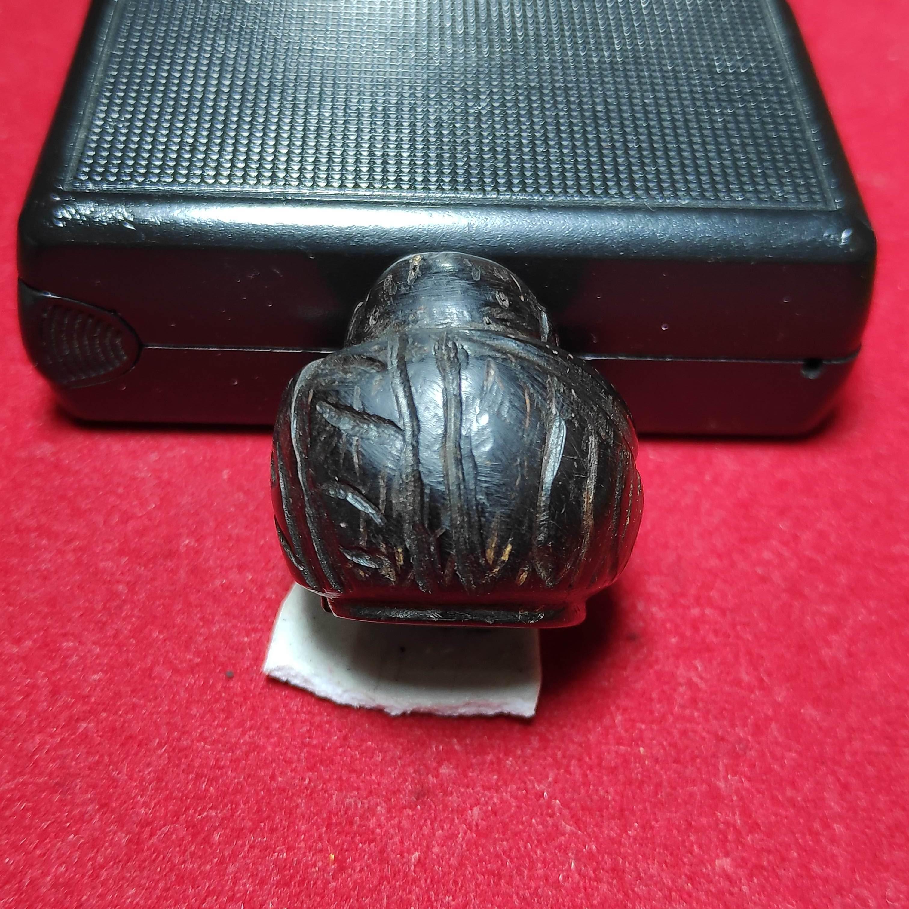 พระปิดตาคตมะพร้าวเเกะอุดกริ่ง