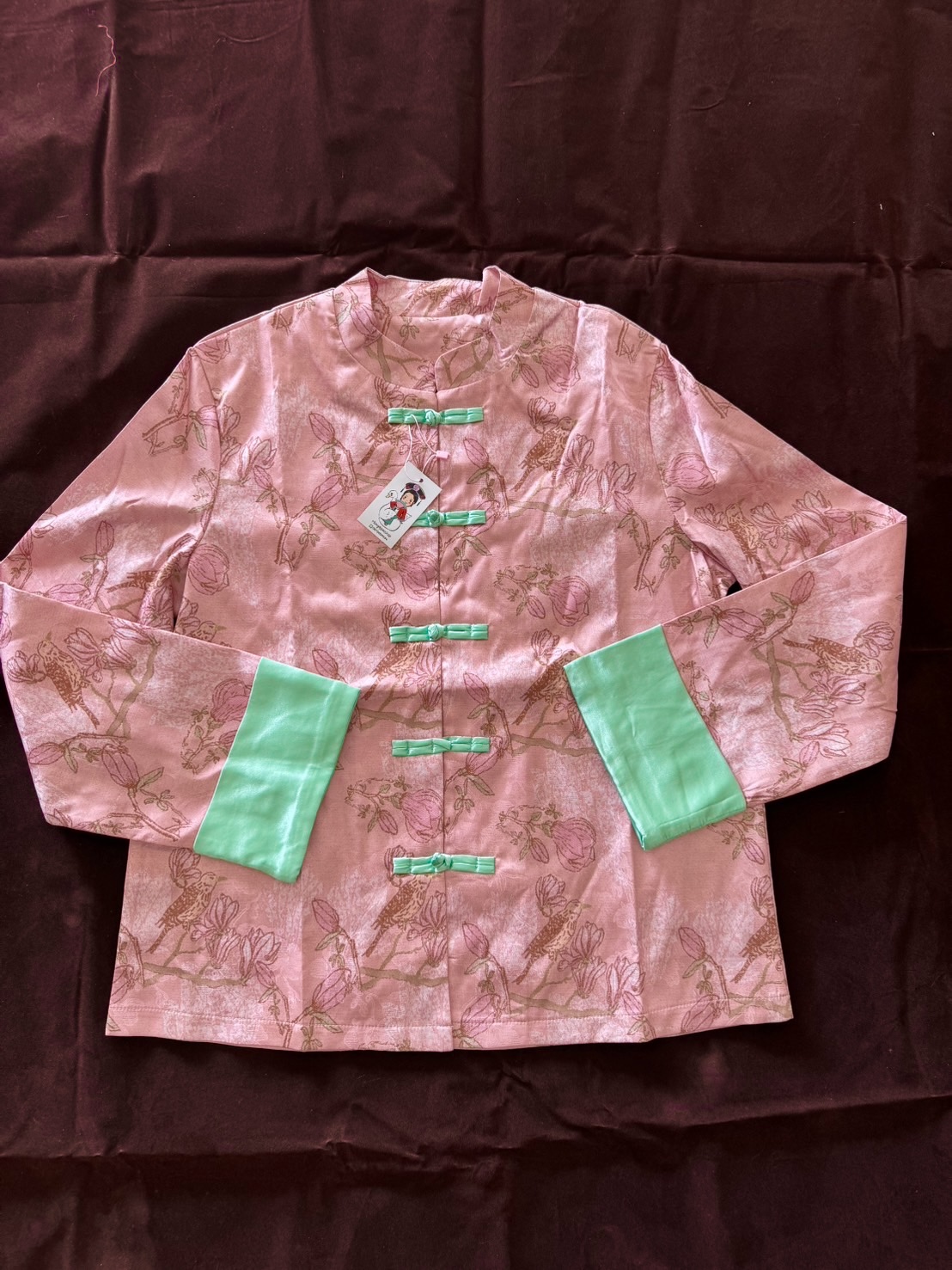 เสื้อจีนสีชมพู ขอบแขนเขียว