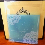 ล้างสต็อก//ถุงคุกกี้ แถบกาว 7x7 ลายโบว์ลูกใม้ขาว พื้นหลังสีฟ้าอ่อน แพ็ค 100 ใบ