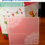 ล้างสต็อก//ถุงคุกกี้ แถบกาว 7x7 ลายโบว์ลูกใม้ขาว พื้นหลังสีชมพูอ่อน แพ็ค 100 ใบ