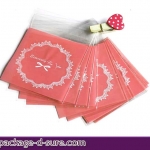 ล้างสต็อก//ถุงคุกกี้ แถบกาว 7x7 ลายโบว์ลูกใม้ พื้นหลังสีชมพูอ่อน แพ็ค 100 ใบ