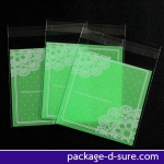 ล้างสต็อก//ถุงคุกกี้ แถบกาว 10x11 ลายโบว์ลูกใม้ขาว พื้นหลังสีเขียวอ่อน แพ็ค 100 ใบ