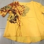 เสื้อผ้าฝ้าย แบบสวมหัว สีเหลืองลายสกรีน รหัส HM 28สินค้าพร้อมส่ง