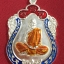 เหรียญเสมาลงยาหลวงปู่ฮกวัดราษฎร์เรืองสุขจ.ปี2558